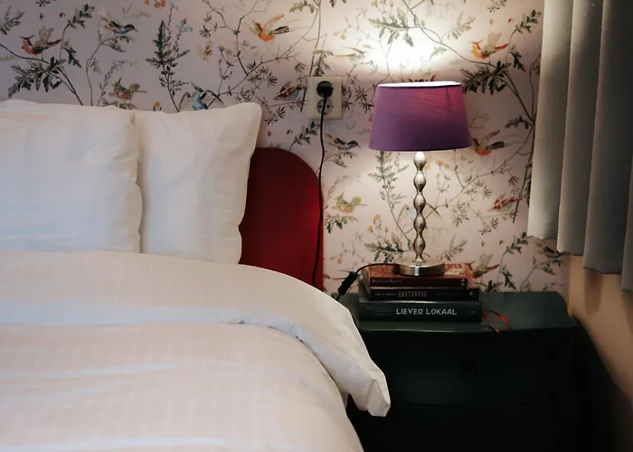 Rosalia's Menagerie Cocktail Bar & Innupstairs Hotel